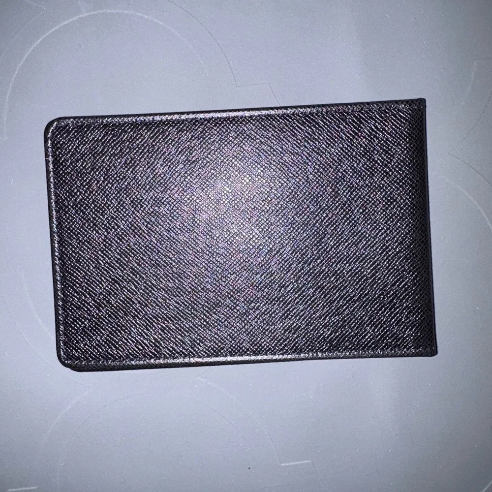 Vintage black Louis Vuitton passport holders‎